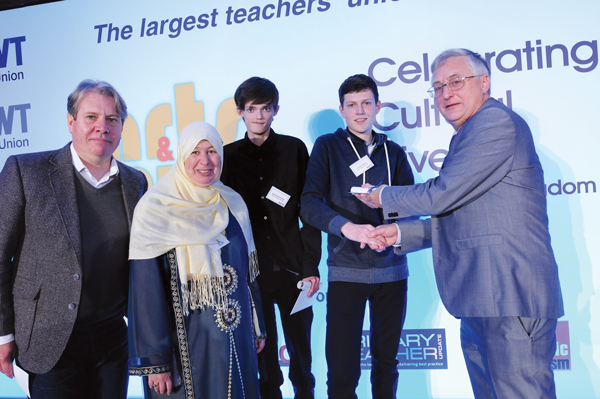 Teachers at Dawn House School Andrew Metcalfe and Yasumin Alkattan, winning pupils from Dawn House School Alex Kendrick-Allen and Thomas Hitchen and NASUWT President Geoff Branner, who presented them with the award