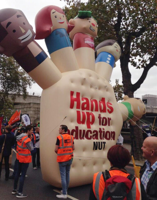 The NUT had a giant inflatable hand for the march - high five to that!