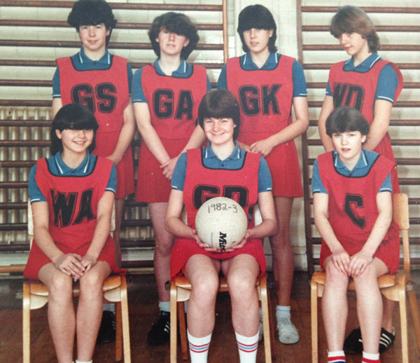 Jo-Anne (second from right, back row) playing as Goal Keeper in her school netball team