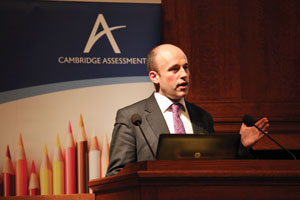 Giving a speech at a Cambridge Assessment seminar