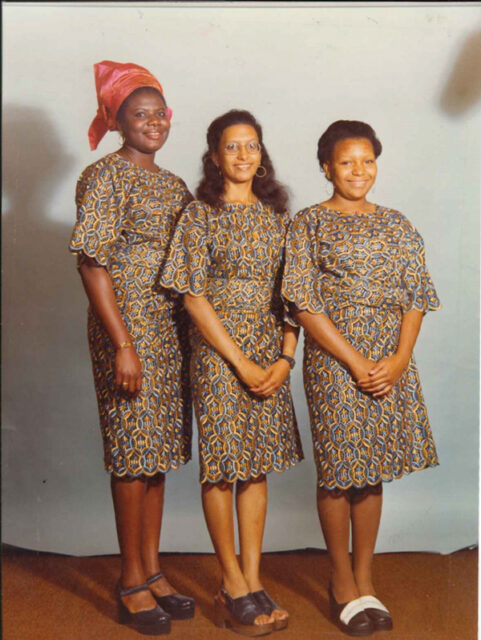 Aged 18 with two of her sisters in Lagos, Nigeria