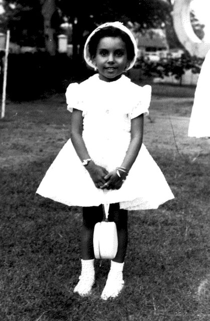 Aged 4 on her christening day in Lagos