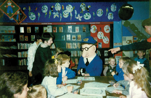 Lynda with Postman Pat and children at Newcastle Central Library in 1986