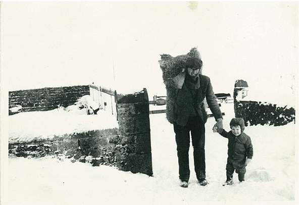 Setting off with his father to feed sheep