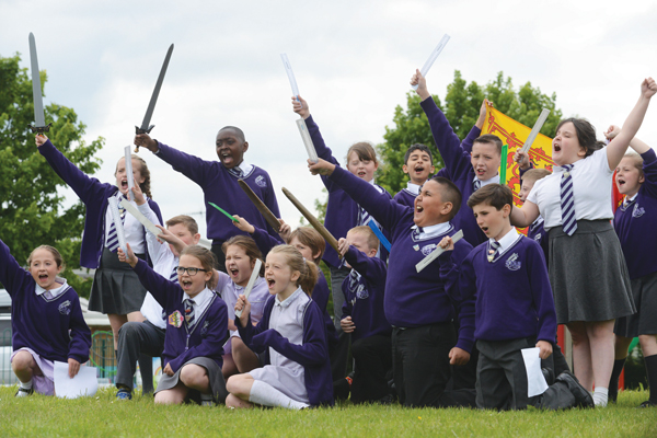 Above: Pupils perform Henry V for number 18, take part in a play