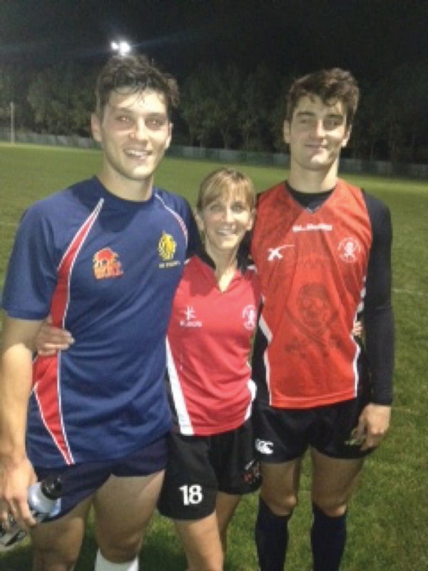 Playing tag rugby with sons Crawford (left) and Sinclair (right)