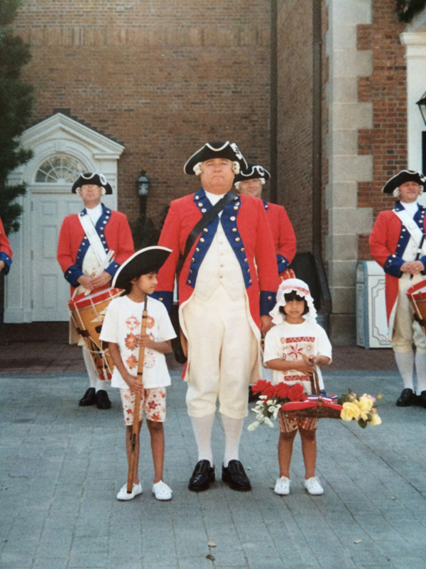 Family holiday: Aged 8 with Aneesha (5), at an independence day parade in Florida 