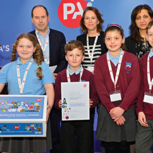 Egglescliffe Church of England Primary pupils are presented with their prize