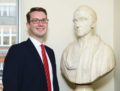 James Townsend with a bust of Joshua Watson