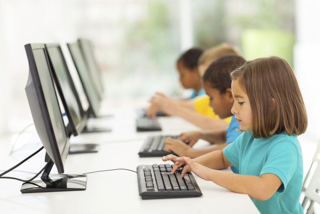 elementary school students in computer class | Schools Week