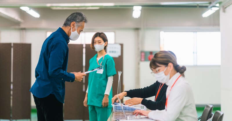 senior-man-listening-to-explanation-for-filling-in-medical-record-picture-id1304464233 | Schools Week
