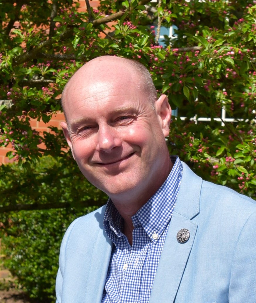 Headshot of Paul K Ainsworth