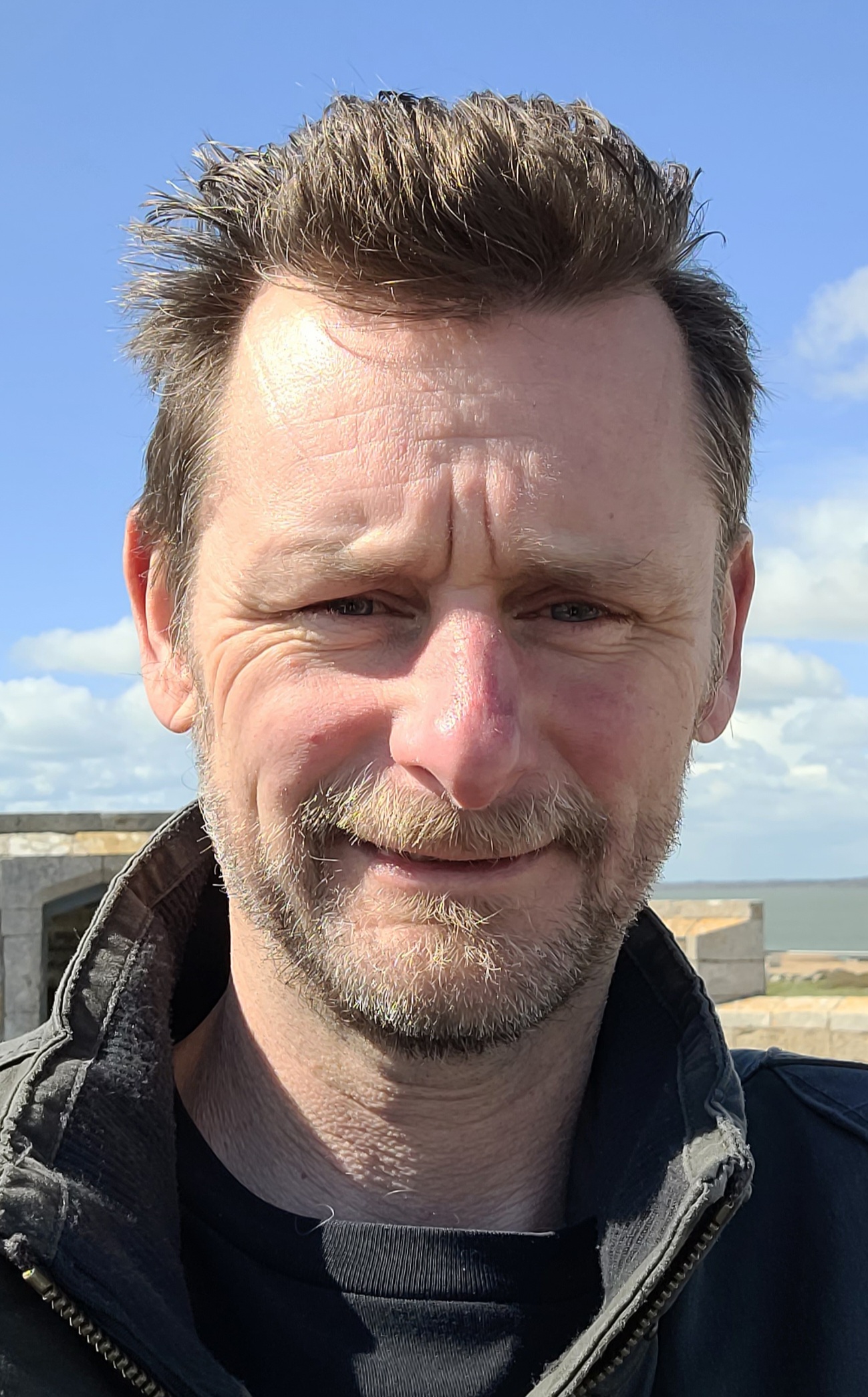 Headshot of Paul White