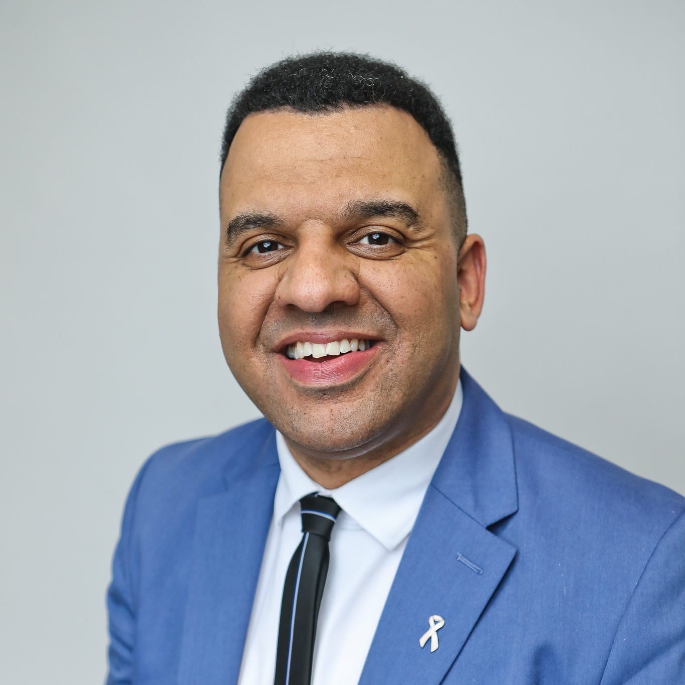 Headshot of Clive Lawrence